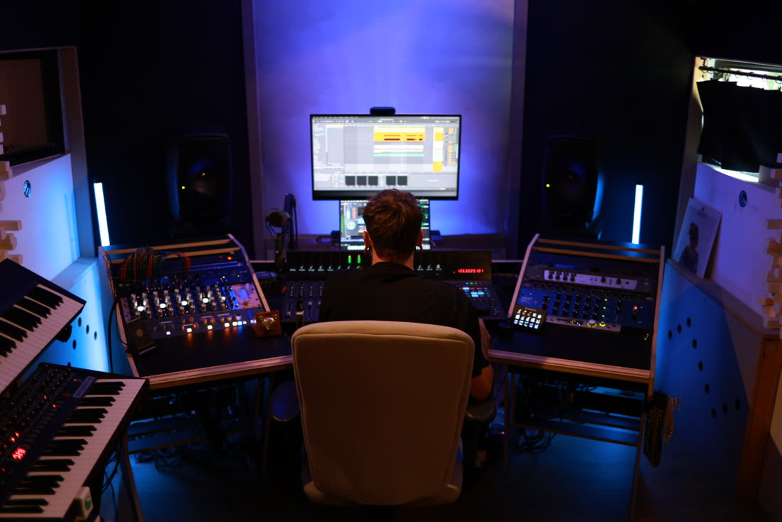 The mixing position seen from behind during a session.